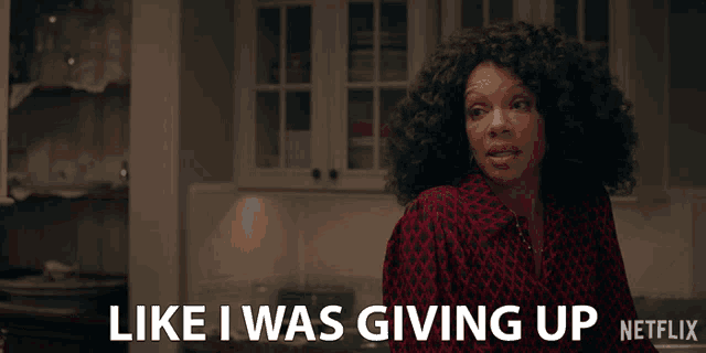 a woman in a kitchen says like i was giving up