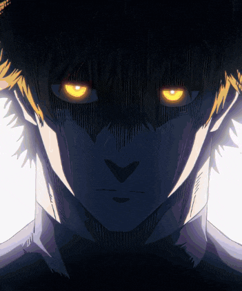 a close up of a man 's face with glowing yellow eyes