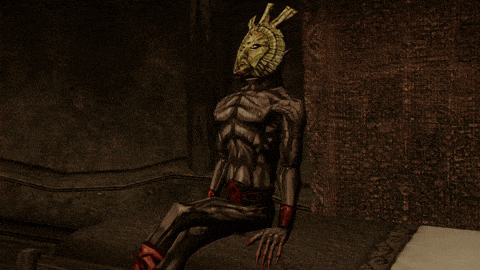 a statue of a monster with a crown on his head