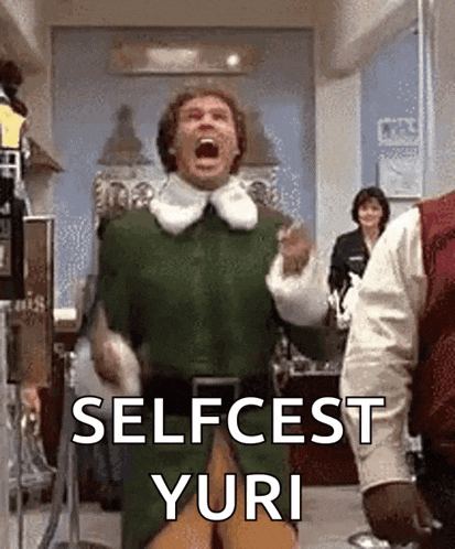 a man in a green elf costume is screaming with the words selfcest yuri written below him .
