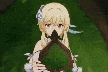 a blonde anime girl with a flower in her hair is holding a leaf