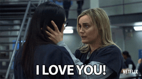 two women are touching each other 's faces and one of them says i love you