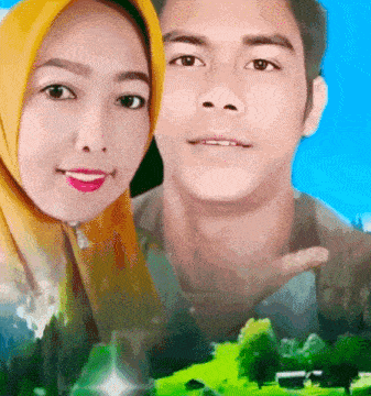a man and a woman are posing for a picture in front of a green field
