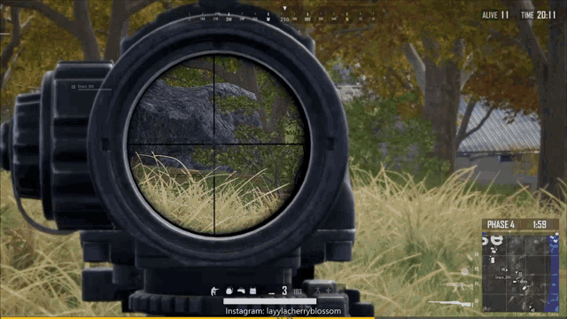 a video game screen shows a sniper aiming at a rock in a field