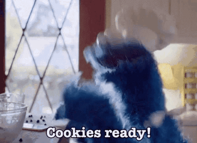 a cookie monster says " cookies ready " while wearing a chef 's hat