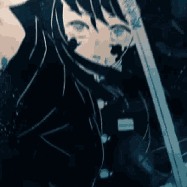 a close up of a person holding a sword in their hand .