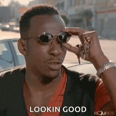 a man wearing sunglasses and holding a bunch of keys is looking good .