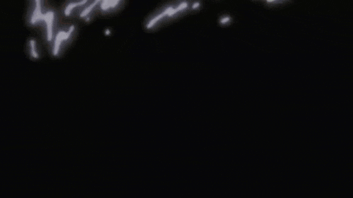 a black and white swirl in the dark
