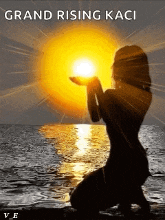 a woman is kneeling on a beach holding the sun in her hands