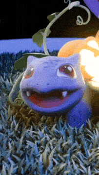 a purple cartoon character with a pumpkin in the background