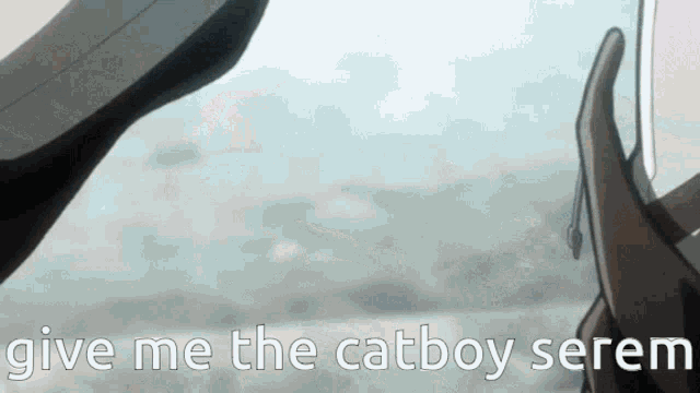 a person holding a cell phone with the words give me the catboy serem written on it