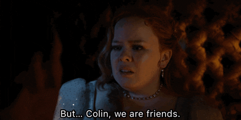 a woman in a white dress says " but colin we are friends "
