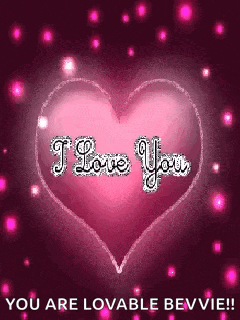 a pink heart with the words `` i love you '' on it .