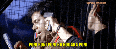 a man is holding a gun to his ear and says " poni poni poni ka kodaka poni " on the bottom