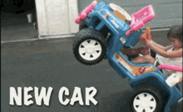 a little girl is playing with a toy jeep with the words " new car " below it
