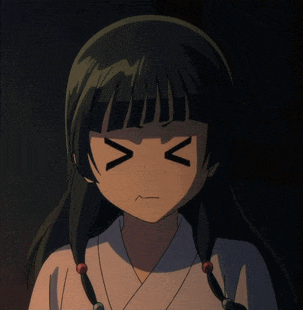 a close up of a girl 's face with a smirk on it