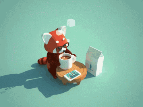 a red panda sitting on a table with a cup of coffee