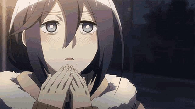 a girl with purple hair and blue eyes holds her hands to her face