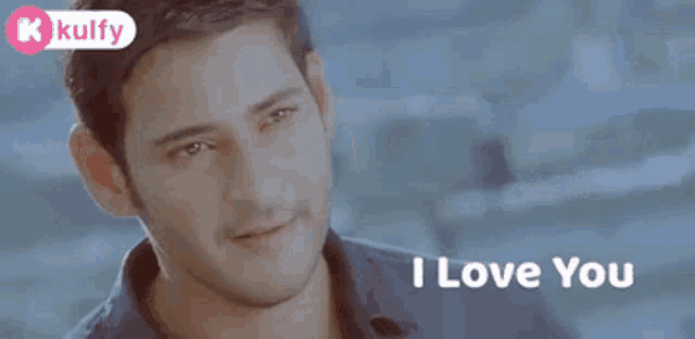 a close up of a man 's face with the words `` i love you '' written on it .