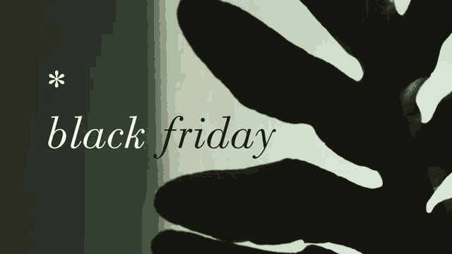 a black friday advertisement with a shadow of a hand