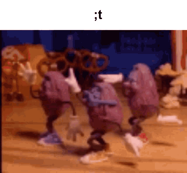 a group of cartoon characters are dancing together in a room .