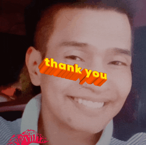 a man is smiling with the words thank you on his face