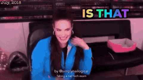 a woman in a blue jacket is sitting at a desk with the words `` is that '' written above her .