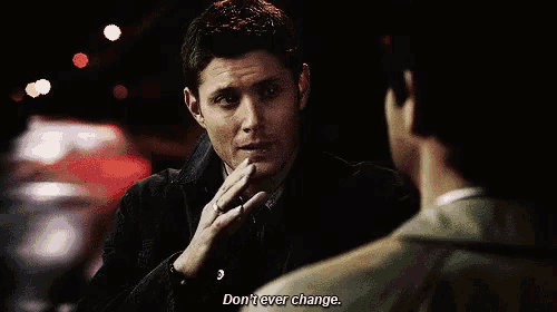 a man is talking to another man in a dark room and says `` do n't ever change . ''