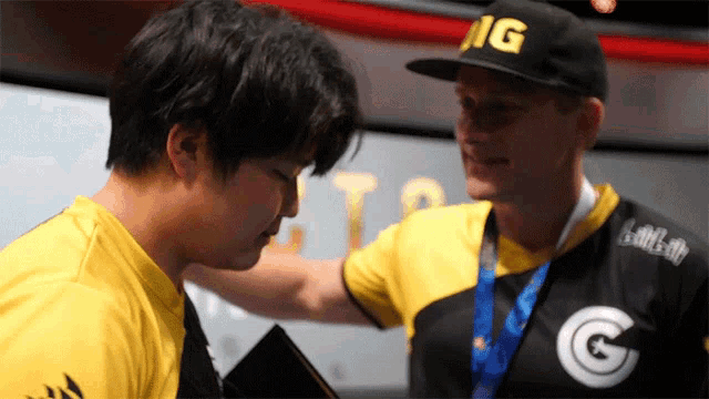 a man wearing a hat that says ig on it