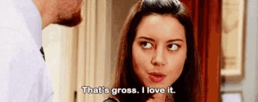 a woman is talking to a man and says `` that 's gross . i love it . ''