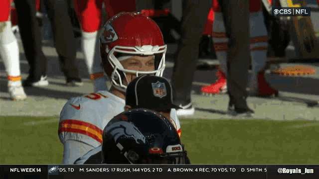 a football player wearing a helmet with the number 5 on it