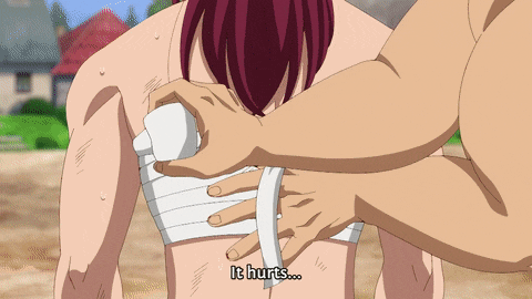 a person with a bandage on their chest is being held by another person who says it hurts
