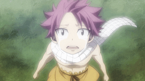 a boy with pink hair and a scarf around his neck