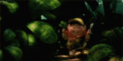 a cartoon character from the movie up is holding a knife and fork in his hands .