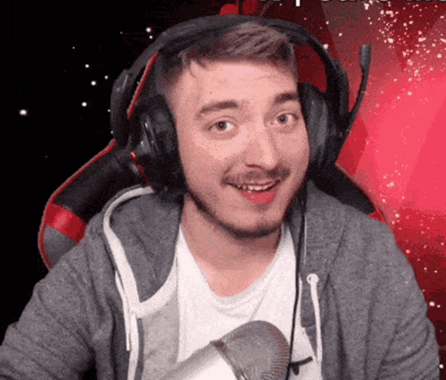 a man wearing headphones and a nike shirt