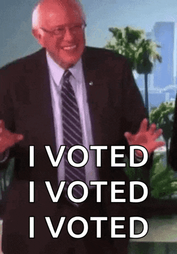 a man in a suit and tie is saying i voted i voted i voted .