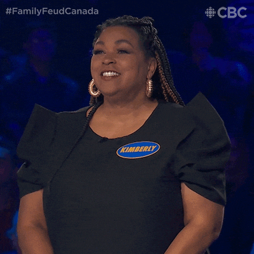 a woman wearing a black shirt that says kimberly on it