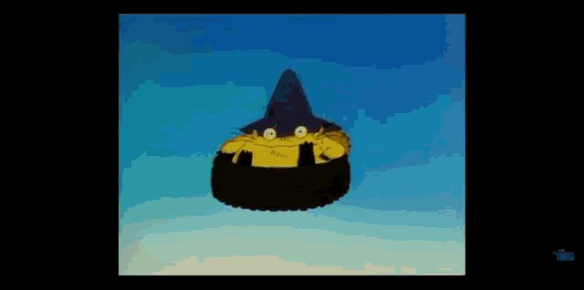 a cartoon character is flying through the air wearing a witch hat .