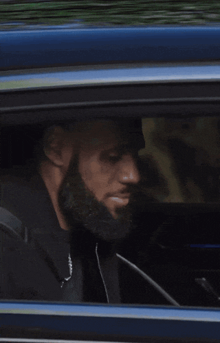 a blurry picture of a person in a car