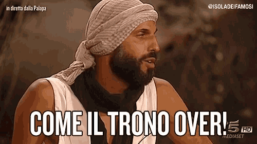 a man with a beard is wearing a head scarf and says come il trono over