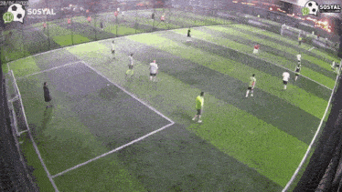 a group of soccer players are playing on a field that says sosyal on it