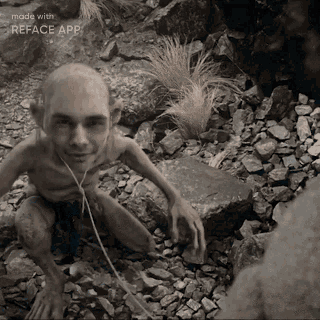 a black and white photo of a naked man with a reface app on the bottom