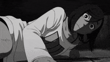 a black and white drawing of a woman laying on the floor