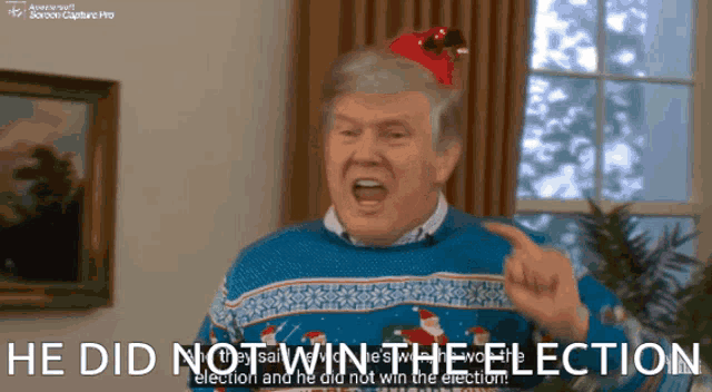 a man wearing a santa hat says he did not win the election and he did not win the election
