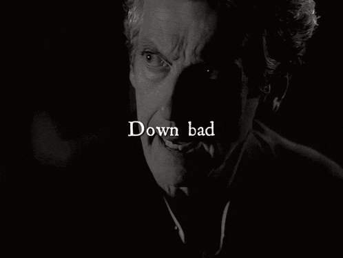 a black and white photo of a man with the words down bad written below him