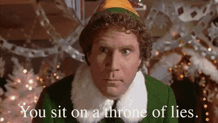 a close up of a man dressed as an elf with the words `` you sit on a throne of lies . ''