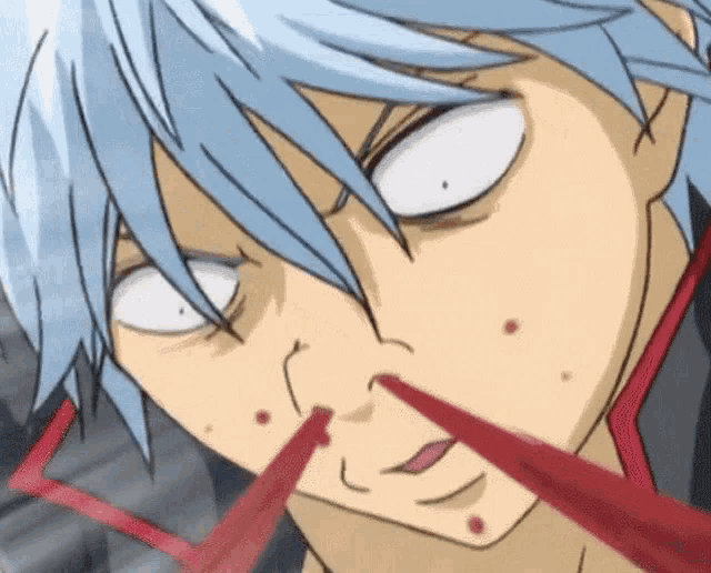 a close up of a person 's face with red lines coming out of his nose