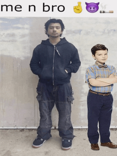 a man in a black hoodie stands next to a boy in a blue shirt