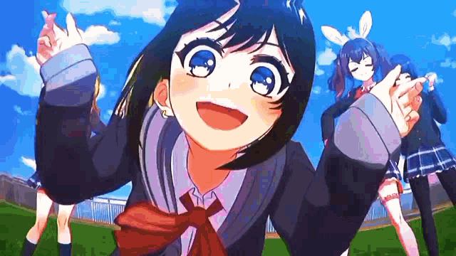a girl in a school uniform with bunny ears is standing in a field with other girls .