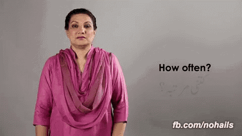 a woman in a pink top is asking how often
